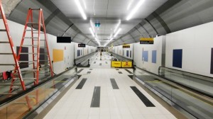 Uma imagem interior do túnel de pedestres quase completo no Billy Bishop Airport (Portos de Toronto)