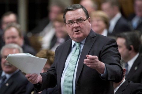 O Ministro das Finanças Jim Flaherty responde a uma pergunta durante o período de perguntas na Câmara dos Comuns, 19 de março de 2013. (The Canadian Press / Adrian Wyld)