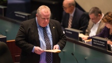 Rob Ford durante a consideração da moção no conselho municipal - 15 novembro, 2013. (The Canadian Press/Chris Young)