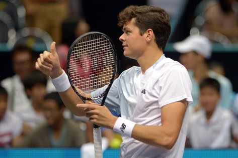 Milos Raonic depois de vencer Richard Gasquet, na meia-final do torneio de ténis ATP Open da Tailândia de 2013, em Bangkok - 28 de setembro de 2013. AFP / Getty Images / Pornchai KITTIWONGSAKUL