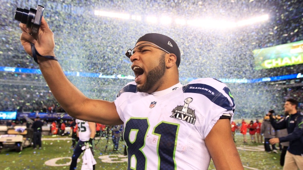 Golden Tate, dos Seattle Seahawks, comemora após terminar o jogo de futebol da NFL Super Bowl XLVIII, contra os Denver Broncos, em East Rutherford, NJ, domingo, 2 de fevereiro, 2014. (AP/Jeff Roberson)