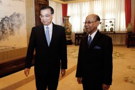 CHINA PROMETE MAIS APOIO À MALÁSIA PARA CONTINUAR BUSCAS POR AVIÃO DESAPARECIDO