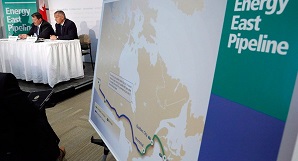 Responsáveis da TransCanada numa conferência de imprensa em Calgary. Foto de arquivo. (The Canadian Press / Jeff McIntosh)