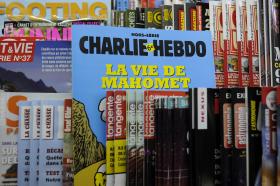 HOMENS ARMADOS ATACAM JORNAL SATÍRICO FRANCÊS FAZENDO VÍTIMAS