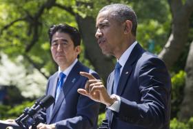 OBAMA E ABE UNEM FORÇAS A FAVOR DE ACORDO TRANSPACÍFICO E NEGAM QUE AMEACE CHINA