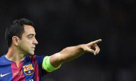 LC: XAVI DESPEDE-SE DO BARCELONA COM QUATRO TÍTULOS E UM RECORDE