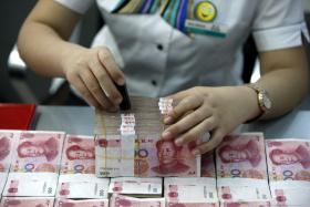 BANCOS CHINESES ANUNCIAM LUCROS IMPULSIONADOS POR NEGÓCIOS NO EXTERIOR