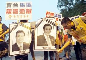 PROTESTOS EM TAIWAN HORAS ANTES DA CIMEIRA HISTÓRICA DOS LÍDERES DE TAIPÉ E PEQUIM
