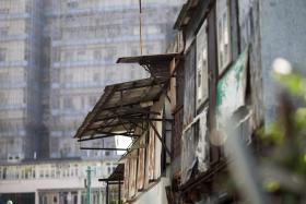 ALDEIA HISTÓRICA DE HONG KONG À BEIRA DA DEMOLIÇÃO
