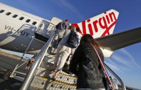 ACIONISTA CHINÊS DA TAP COMPRA PARTICIPAÇÃO EM TRANSPORTADORA AÉREA AUSTRALIANA