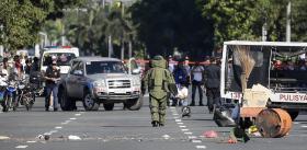 POLÍCIA DE MANILA DESATIVA ALEGADA BOMBA PERTO DE EMBAIXADA DOS EUA
