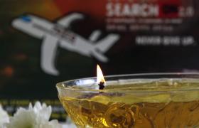 FAMILIARES DAS VÍTIMAS DO MH370 PEDEM QUE AS BUSCAS CONTINUEM