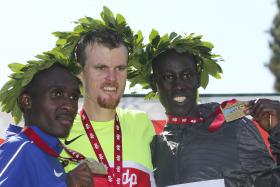 NEOZELANDÊS JAKE ROBERTSON E ETÍOPE MARE DIBABA VENCEM MEIA-MARATONA DE LISBOA