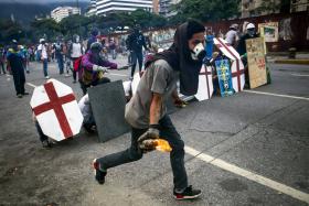 OPOSIÇÃO DESAFIA REPRESSÃO NA VENEZUELA E TENTAR AVANÇAR ATÉ AO PARLAMENTO