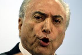 PRESIDENTE BRASILEIRO DIZ SER VÍTIMA DE “ARMAÇÃO DE BANDIDOS” QUE “QUEREM SAIR IMPUNES”