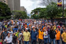 MNE DIZ QUE PORTUGAL ESTÁ PREPARADO E A APOIAR OS QUE REGRESSAM DA VENEZUELA