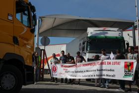 TRABALHADORES DE ARMAZÉM DE DIA BARRAM “VÁRIOS HORAS” CAMIÕES – SINDICATO