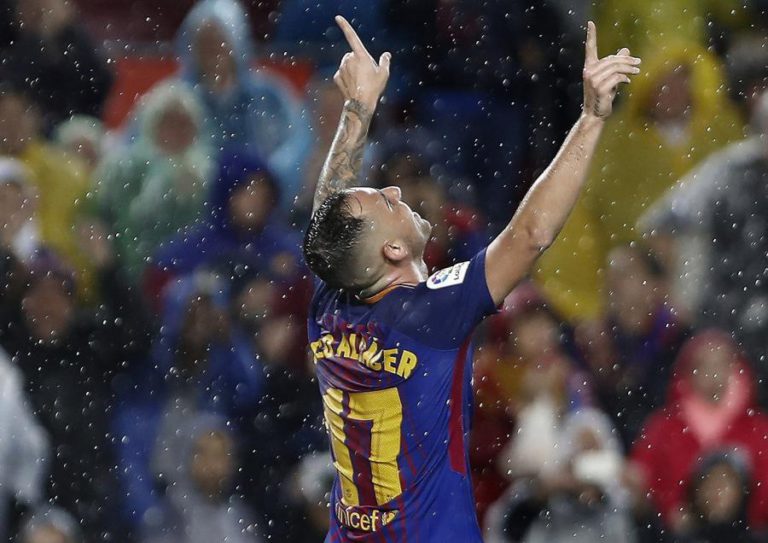 BARCELONA SOFRE PARA VENCER SEVILHA 2-1, MAS MANTÉM VALÊNCIA A QUATRO PONTOS