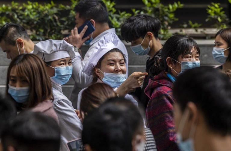 Covid-19: China com 16 casos em 24 horas, dois de contágio local
