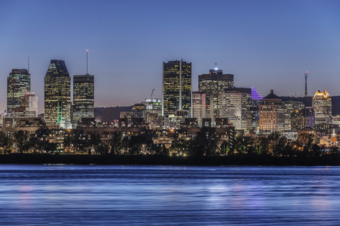 Montreal, Quebec, Canada,Montreal city skyline lit up at night, Quebec, Canada