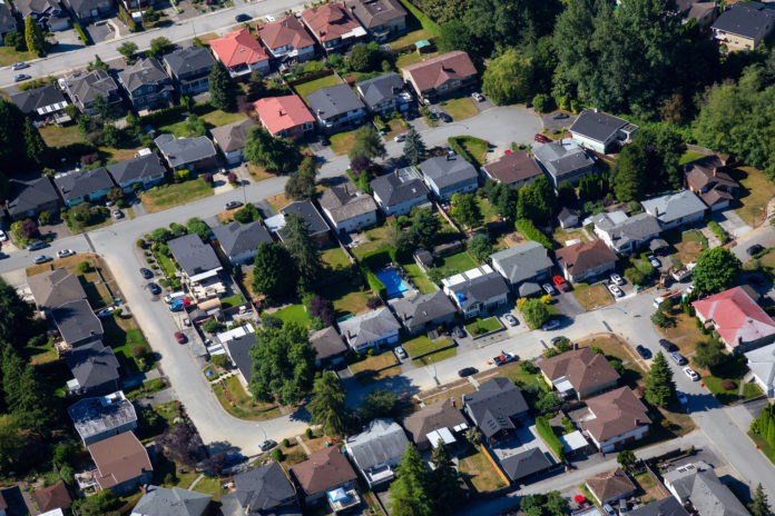 Aerial view of the residential homes in a suburban neighborhood.