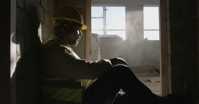construction-worker-resting-in-shadows-on-an-indus-2026-06-04-05-23-41-utc