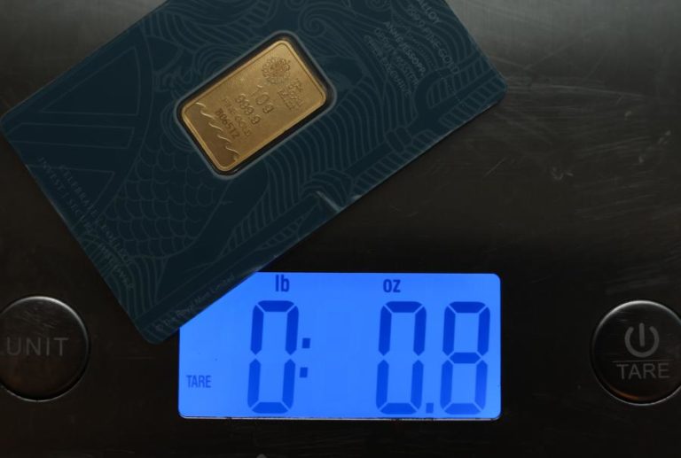 Preços do ouro e bitcoin disparam com venda de dólares e dívida recorde dos EUA