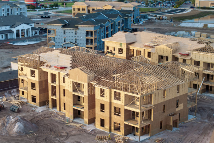 Apartment condos under construction. Development of residential housing in North Port, Florida. Real estate market in the USA